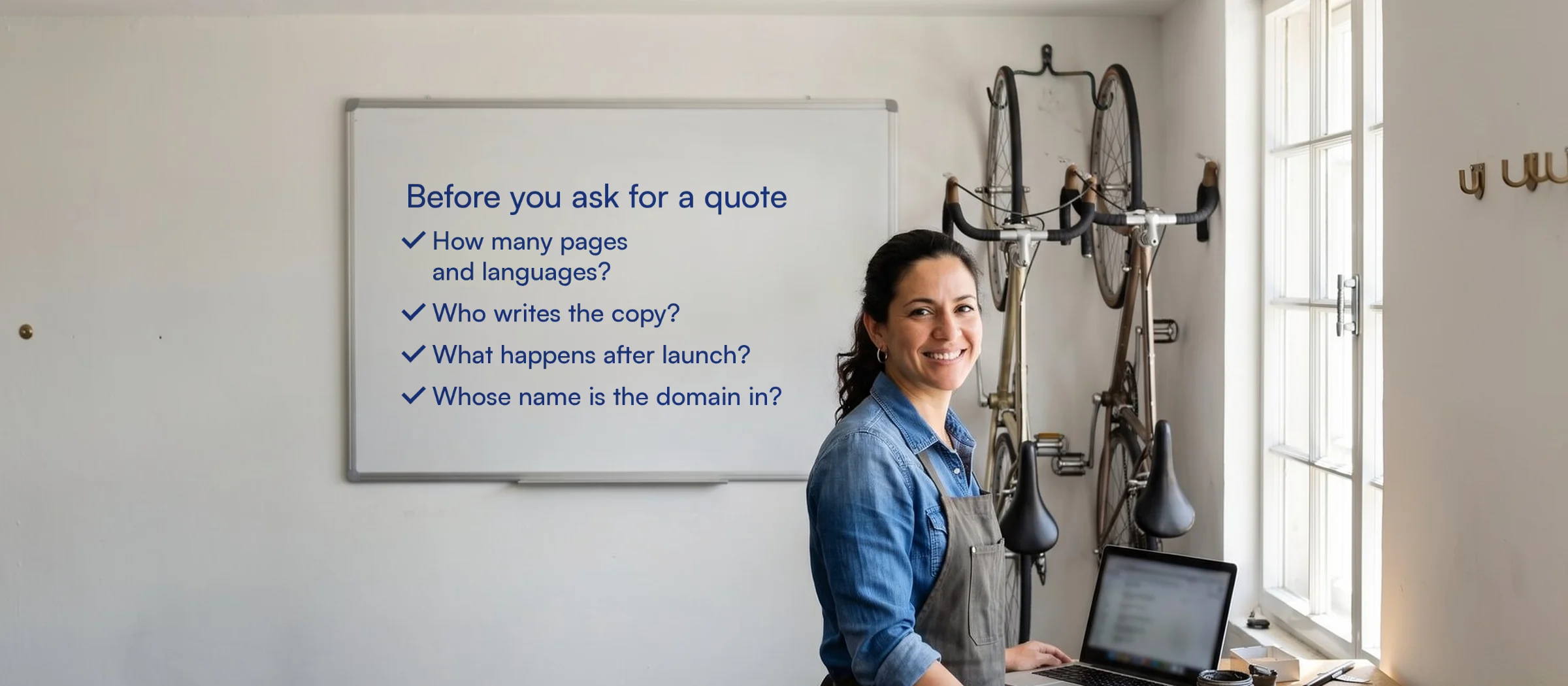 Bike shop owner in Coconut Grove next to a whiteboard: before you ask for a quote, ask how many pages and languages, who writes the copy, what happens after launch and whose name the domain is in.